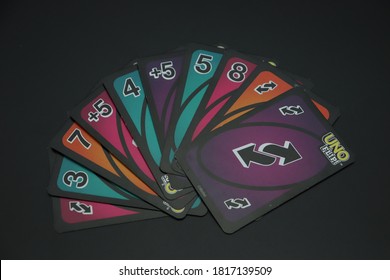 Selangor, Malaysia. September 18th 2020: An Image Of Uno Flip Card. Uno Flip Card Had 2 Side. Which Is Dark Side And Light Side. Isolated On Black Background.