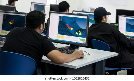SELANGOR,MALAYSIA-MARCH 8,2018: A college students are designing and doing analysis in CAD software. Working on their project assignment in lab design near Bangi,Selangor. Shot taken on March 8,2018.