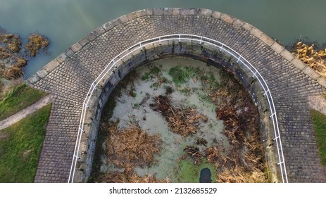 Selby, North Yorkshire, England, Britain, March, 2022, Aerial view of flood tunnel collection ponds (sump) on Selby Canal listed architecture from industrial revolution designed by William Jessop