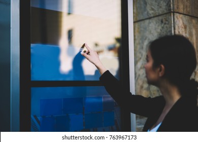 Select Focus On Woman's Finger Choosing Category On Screen On Modern Terminal To Making Payment Standing On Street.Businesswoman Transferring Money Using Automated Display Of Bankomat