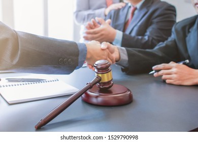 select focus,Attorneys or legal counsel is consulting the client about the dispute in order to have the case settled correctly in the courtroom.
Concept of obtaining counsel from Attorneys - Shutterstock ID 1529790998