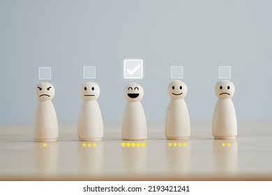 Select Happy Face Wooden Figure With 5 Star. Customer Service Rating Experience And Feedback Emotion And Satisfaction Survey. Human Resources Management Choosing Positive Attitude To Team.