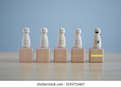 Select Happy Face Wooden Figure With 5 Star. Customer Service Rating Experience And Feedback Emotion And Satisfaction Survey. Human Resources Management Choosing Positive Attitude To Team.