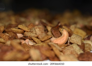 Selected Focus Of Chex Mix Spread Out On A Counter