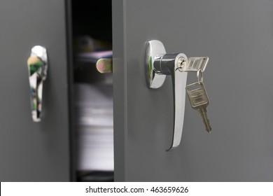 Selected Focus And Closeup Of Steel Filing Cabinet With The Key. Our Lateral Metal Filing Cabinets Are Very Useful If Your Office Has Limited Space And Protect Files Including Confidential Documents.