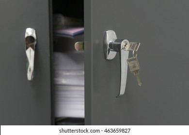 Selected Focus And Closeup Of Steel Filing Cabinet With The Key. Our Lateral Metal Filing Cabinets Are Very Useful If Your Office Has Limited Space And Protect Files Including Confidential Documents.