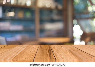 Selected focus empty brown wooden table and Coffee shop blur background with bokeh image, for product display montage - Shutterstock ID 344079272