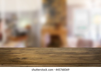 Selected focus empty brown wooden table and Coffee shop blur background with bokeh image. for your photomontage or product display
