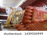 (Selected focus)  Kyauk Htat Gyi Reclining Buddha in Yangon Myanmar.Is a Big Buddha located in the heart of downtown 