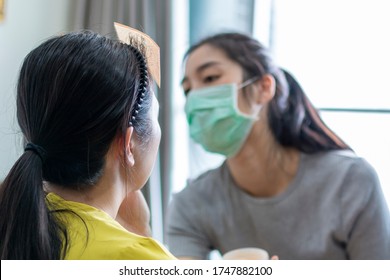 Selected Focus On Model For Makeup. Makeup Artist Wearing Face Mask Doing Makeup For Girl Indoor During Covid 19. Makeup Artist Doing Make Up For Young Beautiful Bride.