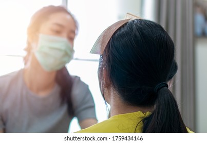 Selected Focus On Model For Makeup. Makeup Artist Wearing Face Mask Doing Makeup For Girl Indoor During Covid 19. Makeup Artist Doing Make Up For Young Beautiful Bride.