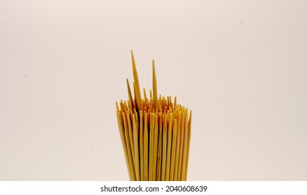 selectic focus,Stack of white wooden toothpicks. A bunch of toothpicks