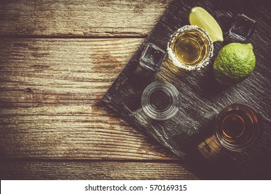 Selection Of Alcoholic Drinks On Rustic Wood Background