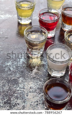 Selection of alcoholic drinks. Set of wine, brandy, liqueur, tincture, cognac, whiskey in glasses. Large variety of alcohol and spirits for making cocktails and drink. Copy space for text