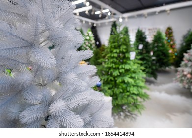 Selection Of Artificial Christmas Trees In The Store