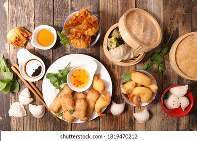 Selection Of Asia Food- Spring Roll, Dim Sum, Fries Shrimp And Sauce