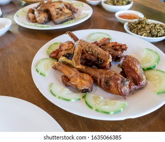 Selection Of Burmese Dishes In Rural Myanmar With Skinny Chicken And Traditional Soup