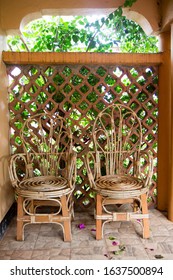 Selection of chairs in diverse forms and mostly hand crafted. Rattan, cane and wood sitting devises. Entebbe