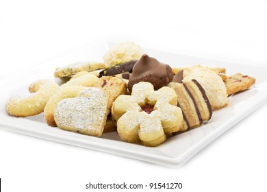 Selection Of Christmas Cookies On A White Plate