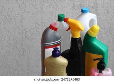 selection of cleaning product in store. text in English: Ultra white, kills for plumbing. plastic dispenser with cleaning liquid on white background  - Powered by Shutterstock