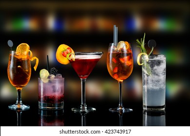 Selection Of Cocktails Martini Spritz Bramble Gin Tonic Bar Blurred Background