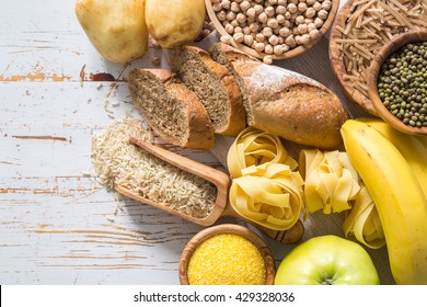 Selection of comptex carbohydrates sources on white background - Shutterstock ID 429328036
