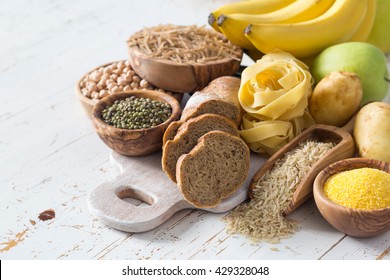Selection of comptex carbohydrates sources on white background - Shutterstock ID 429328048
