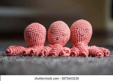 A selection of crochet plush toys in the form of an octopus or jellyfish. Cute soft toys for small kids