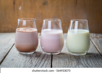 Selection Of Flavoured Milk - Strawberry, Chocolate, Banana, Copy Space