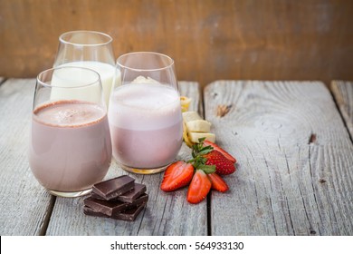 Selection Of Flavoured Milk - Strawberry, Chocolate, Banana, Copy Space