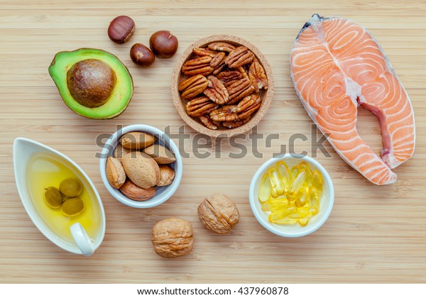 Selection food sources of omega 3 and unsaturated fats.\
Super food high omega 3 and unsaturated fats for healthy food.\
Almond ,pecan ,hazelnuts,walnuts ,olive oil ,fish oil ,salmon and\
avocado .