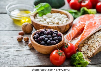 Selection of food that is good for the heart, rustic wood background - Shutterstock ID 376923973