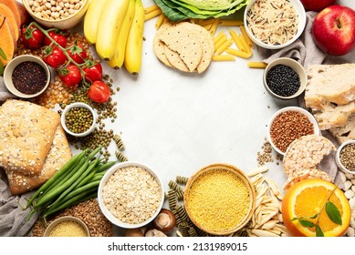 Selection Of Good Carbohydrates Sources - Vegetables, Fruits, Grains, Legumes, Nuts And Seeds On White Background, Top View.