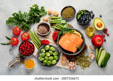Selection of healthy food on light gray background. Clean eating concept. Top view, flat lay - Powered by Shutterstock