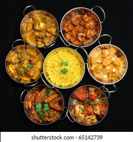 Selection of Indian curries and rice.