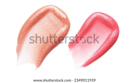 Selection of lip gloss textures isolated on white background. Smudged cosmetic product smear. Makup swatch product sample