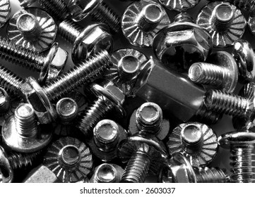 A selection of small screws, used in the manufacture of personal computers - Powered by Shutterstock