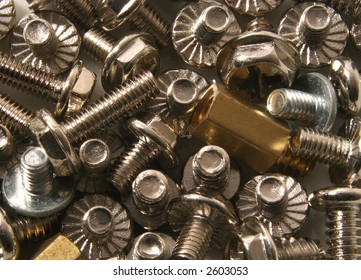 A selection of small screws, used in the manufacture of personal computers - Powered by Shutterstock