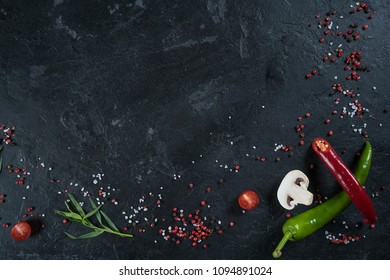 Selection Of Spices Herbs And Greens. Ingredients For Cooking. Food Background On Black Slate Table. Top View Copy Space.