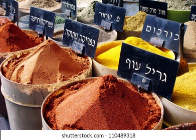 Selection of spices on display for sale in food market in Israel. No people. Copy space