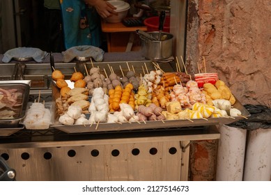 Selection Of Street Food Snacks On Sticks In A Side Street Of Macao.