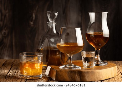 Selection of strong alcoholic drinks. Whiskey, liqueur, tequila, cognac, rum.