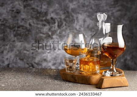 Selection of strong alcoholic drinks. Whiskey, liqueur, tequila, cognac, rum.