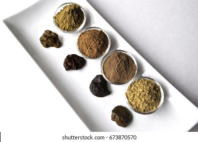 A Selection Of Various Natural Henna (Lawsonia Inermis) Hair Color Dyes Wet Mixture Isolated On White