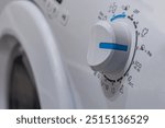 Selection of washing programs in a washing machine, setting the washing machine to eco mode, saving water and energy
