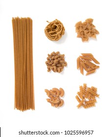 selection of whole grain pasta, isolated on white background: spaghetti, tagliatelle, farfalle, cellentani, penne, fussili 