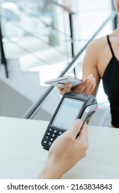 Selective Approach Of A Young Latina Girl Using Mobile Phone Contact Payment