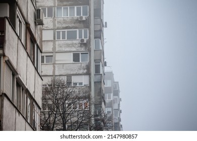 Selective blur on Communist housing buildings, decay, diplapidated, in Belgrade, Serbia, during a foggy mist smog. These are symbol of Socialist architecture  economic transition Eastern Europe faced - Shutterstock ID 2147980857