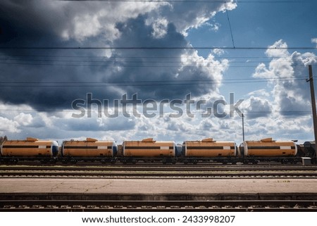 Selective blur on russian train tank cars  wagons containing gas  oil imported from russia, on freight yard cargo train station of Latvia in Jelgava. Energy  oil imports from Russia have decreased.