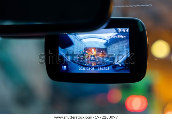 Selective car camera is\
able to capture excellent and clear images while driving into a\
tunnel through a crossroads that illuminate the light into a bokeh\
background.